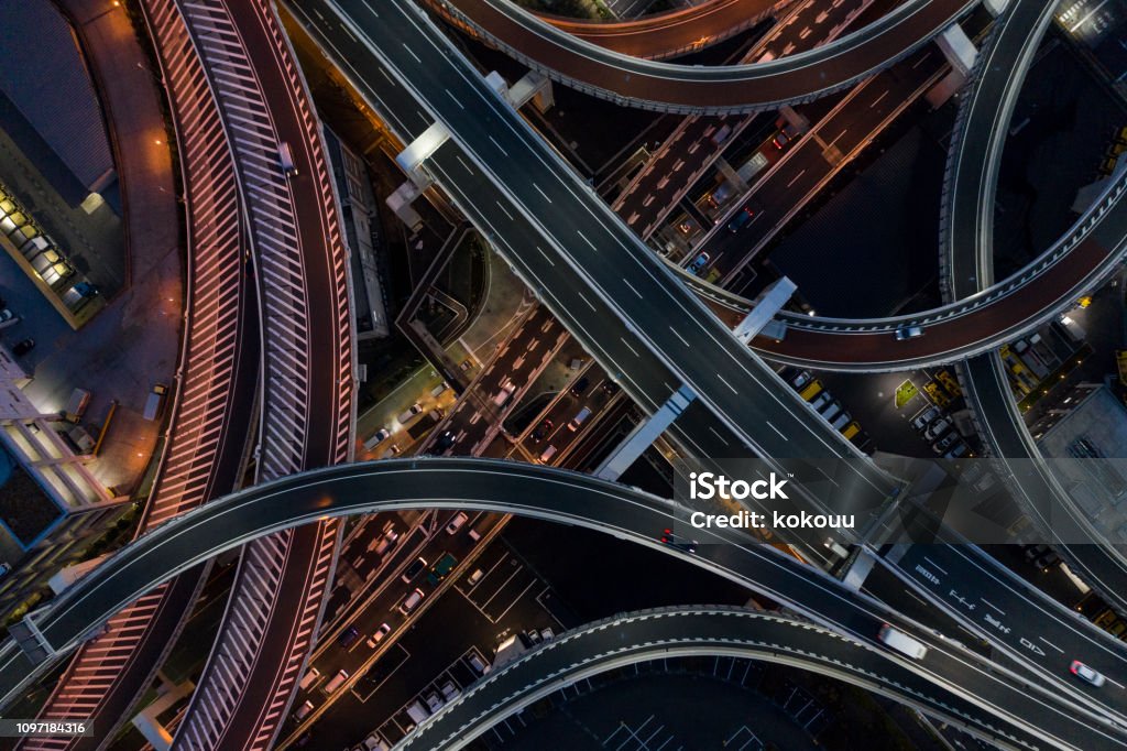 Night photograph of complicated intersecting highway. Night highway with streetlights beautiful. Road Stock Photo