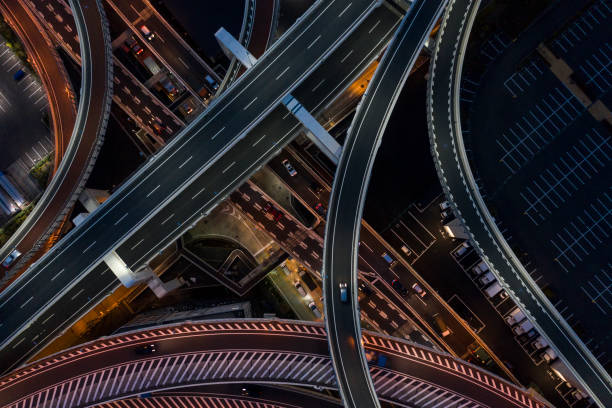istock Night photograph of complicated intersecting highway. 1097184330