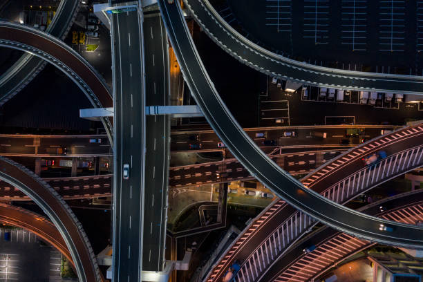 istock Night photograph of complicated intersecting highway. 1097184336
