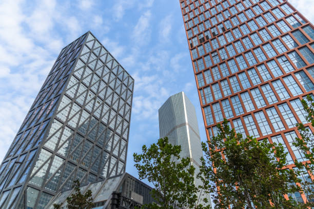 istock Low angle view of modern metallic skyscrapers 1097189894