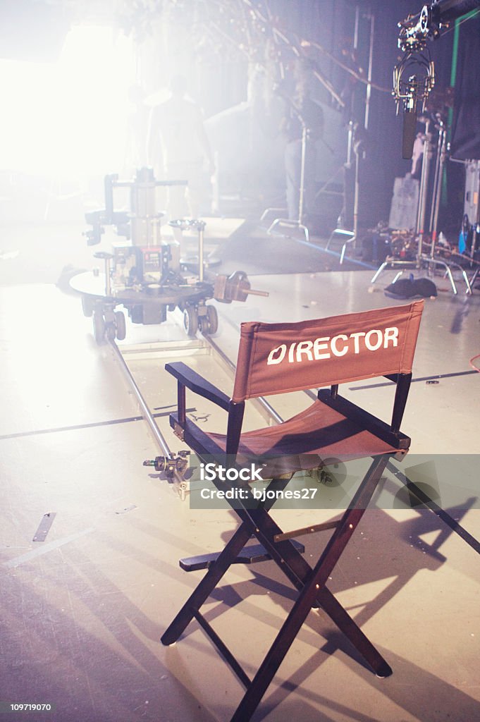 Director's Chair on Movie and Television Set A director's chair on a film set. Director Stock Photo