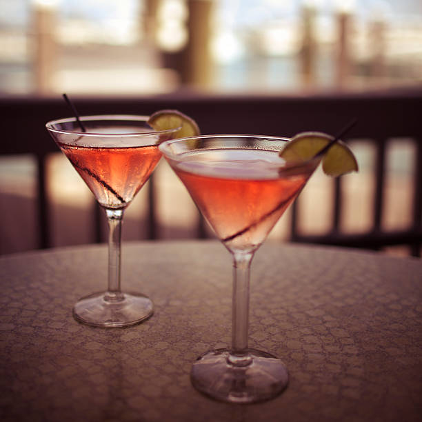 Two Cosmopolitan Martinis cosmopolitan martini stock pictures, royalty-free photos & images