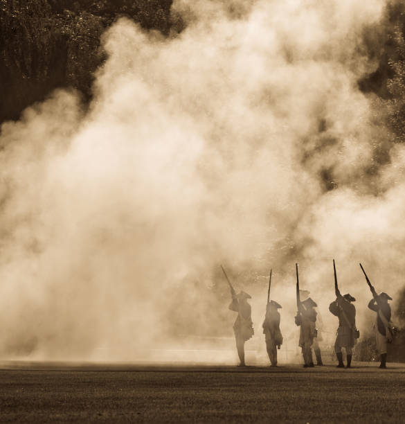 silouettes in cannon smoke