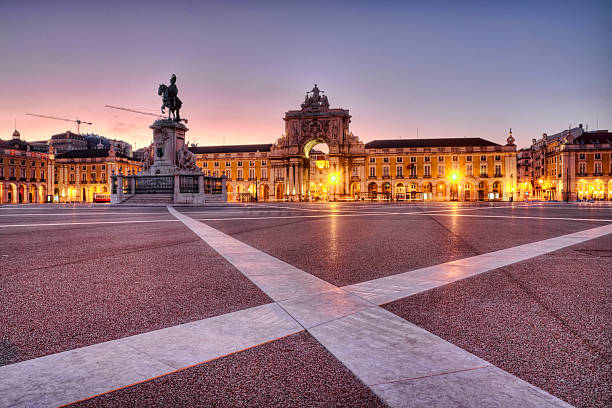 Trade Square in Lisbon HDR image of the Praça do Comércio (Terreiro do Paço) in Lisbon, Portugal, at nightfall. Film and grain simulation on processing. lisbon photos stock pictures, royalty-free photos & images