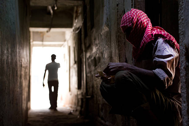 istock Man In Middle Eastern Headscarf Sitting And Counting Money 109719407