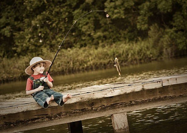 istock Little Fisher Catches a 