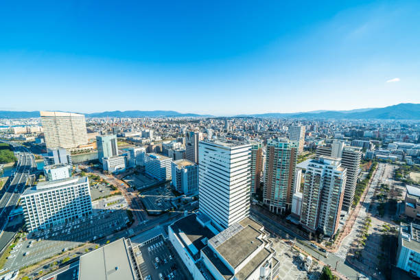 moden city skyline aerial view in Fukuoka Japan Asia Business concept for real estate and corporate construction - panoramic urban townscape aerial view under bright blue sky and sun in Fukuoka Japan fukuoka city stock pictures, royalty-free photos & images