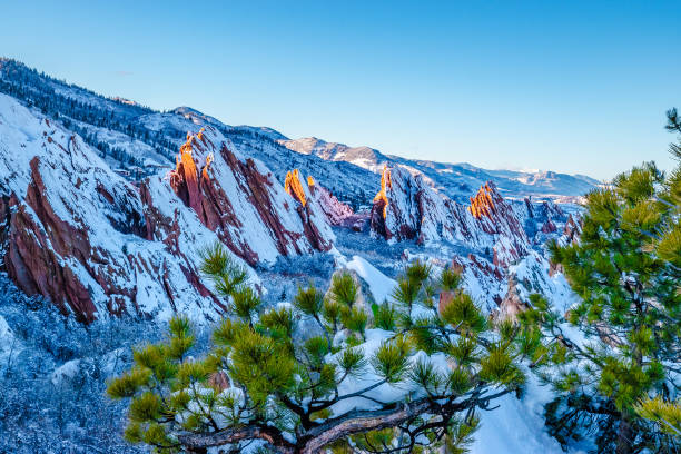 Beautiful Winter Sunset Hike at the Red Rocks in Roxborough State Park in Colorado stock photo