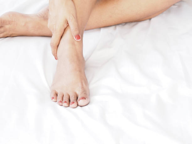 istock woman foot massage by herself 1097199712