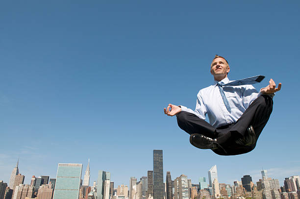 istock Cheerful Businessman Levitating Above City Skyline 109720287