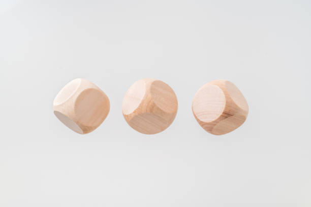 istock Abstract floating wooden dice on white background 1097204068