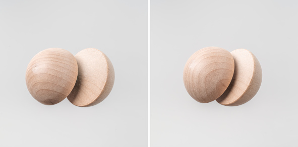 Business & design concept - Abstract geometric real floating wooden half sphere isolated on background, it's not 3D render.