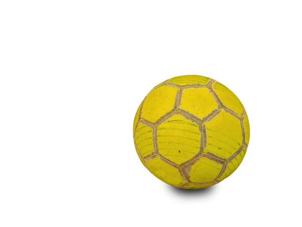 ball soccer yellow old worn isolated in white background