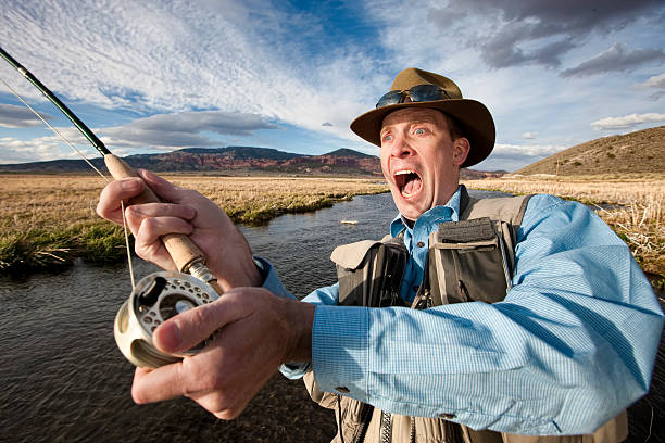 Oh My Gosh I Just Caught A Monster Fish Stock Photo - Download