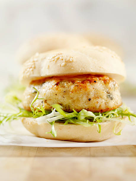 mini hamburger di tacchino con rucola - turkey burger foto e immagini stock