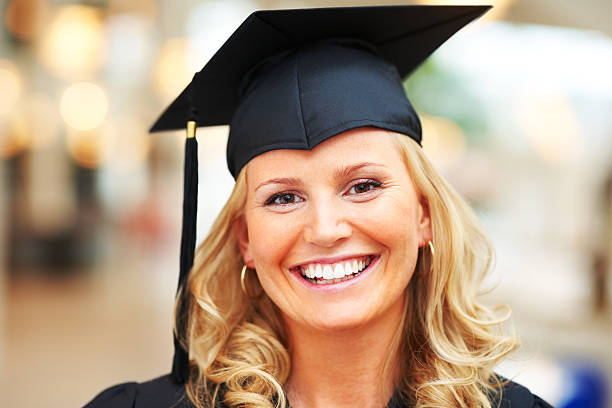 istock Happy young female graduate smiling 109720887