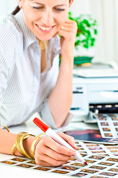 istock Young woman photo editor at work 109720946
