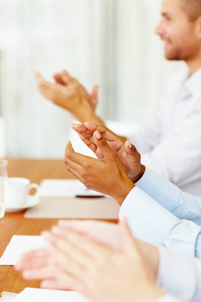 istock Business colleagues clapping hands in office 109721000