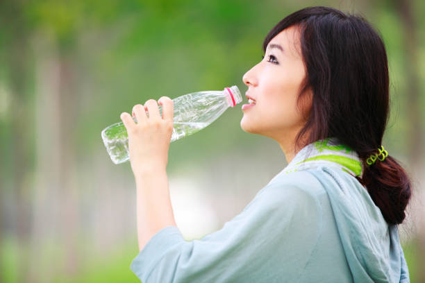 istock young woman drinking water 109721062
