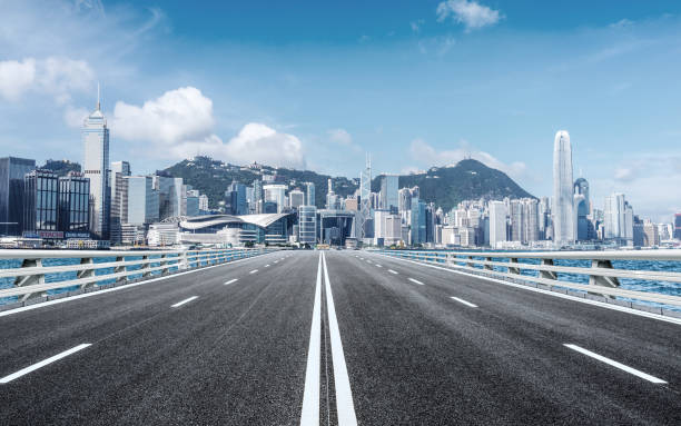 Inner city road Hong Kong, City, Road, Urban Road, Street empty road stock pictures, royalty-free photos & images