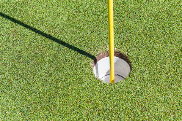 istock Golf Course Hole Green Closeup Flag Stick 1097214652