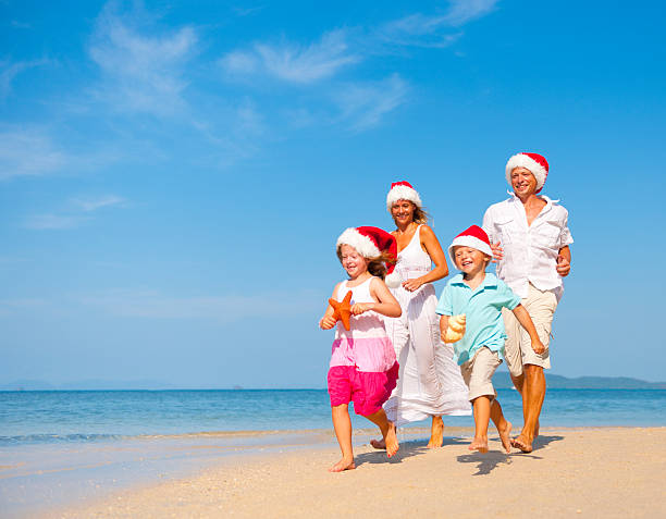 istock Family Celebrating Christmas on  the Beach 109721566