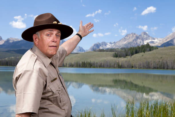 Park Ranger showing the great outdoors http://dieterspears.com/istock/links/button_military.jpg park ranger stock pictures, royalty-free photos & images