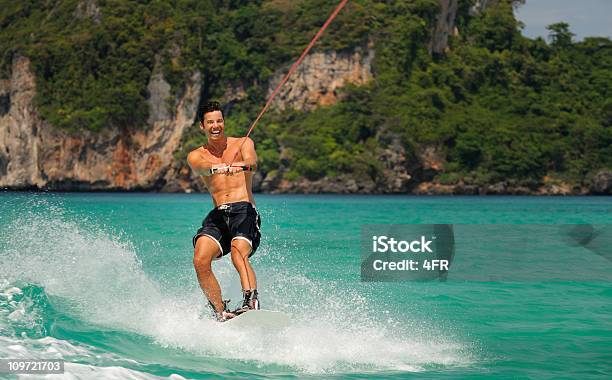 Wakeboarding On Tropical Waters Stock Photo - Download Image Now - Wakeboarding, Men, Seychelles