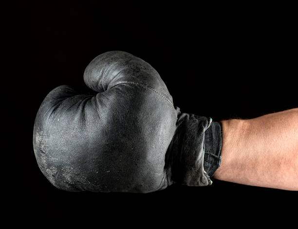 istock boxing glove dressed on man's hand 1097218456