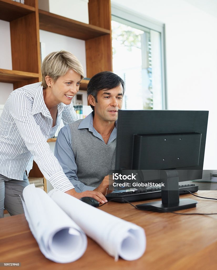 Architects Using Computer Two Architects Working Together On A Computer Stock Photo - Download ...