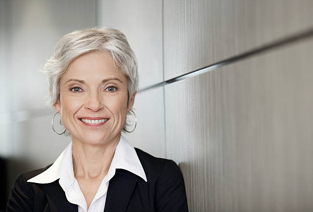 istock Mature executive business woman smiling 109721958