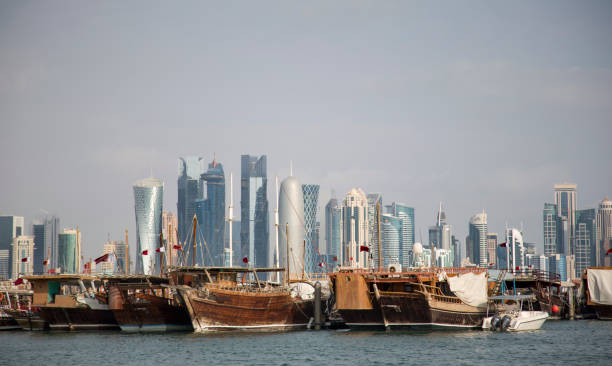 istock Traditiona dhow in front of Doha city scape 1097223772