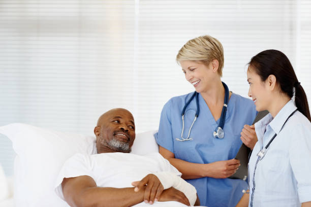 istock Female doctors talking to a patient 109722547