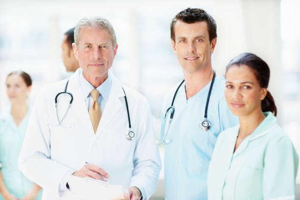 istock Healthcare workers standing against blur background 109722884