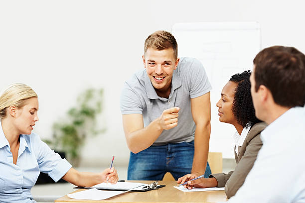 istock Happy business man in a discussion with his team 109722975