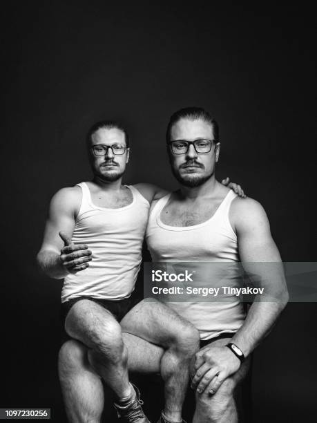 Creative Man Portrait Concept Of Cloning People Black And White Image With Scratches Stock Photo - Download Image Now