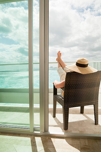 istock Woman Relaxing on Vacation in Hotel Balcony 109723136