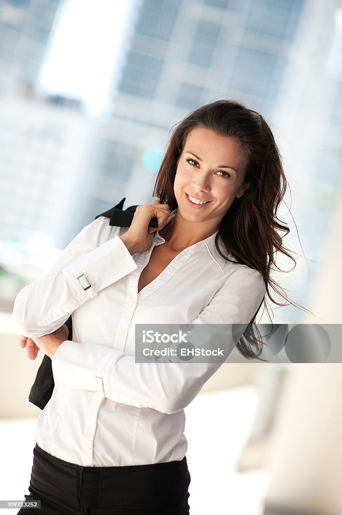 Jovem mulher de negócios com casaco por Cima do Ombro - Royalty-free Adulto Foto de stock