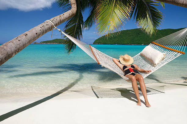 istock woman napping in hammock at a tropical Caribbean beach 109723484