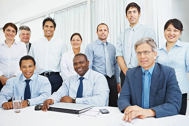 istock Portrait of a smiling business colleagues in conference room 109723607