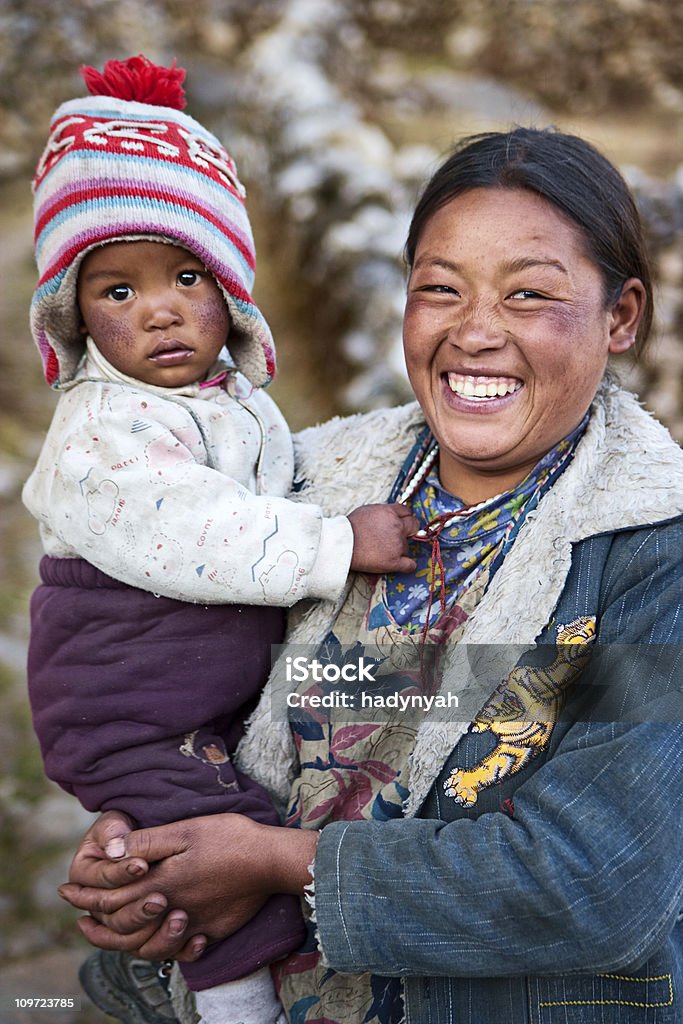 Nepali Frau mit Ihrem baby - Lizenzfrei Familie Stock-Foto