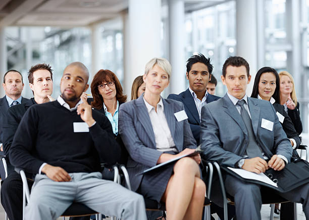 istock Business people sitting together at a seminar 109724009