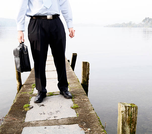 istock Businessman Standing on Dock at Lake 109724102