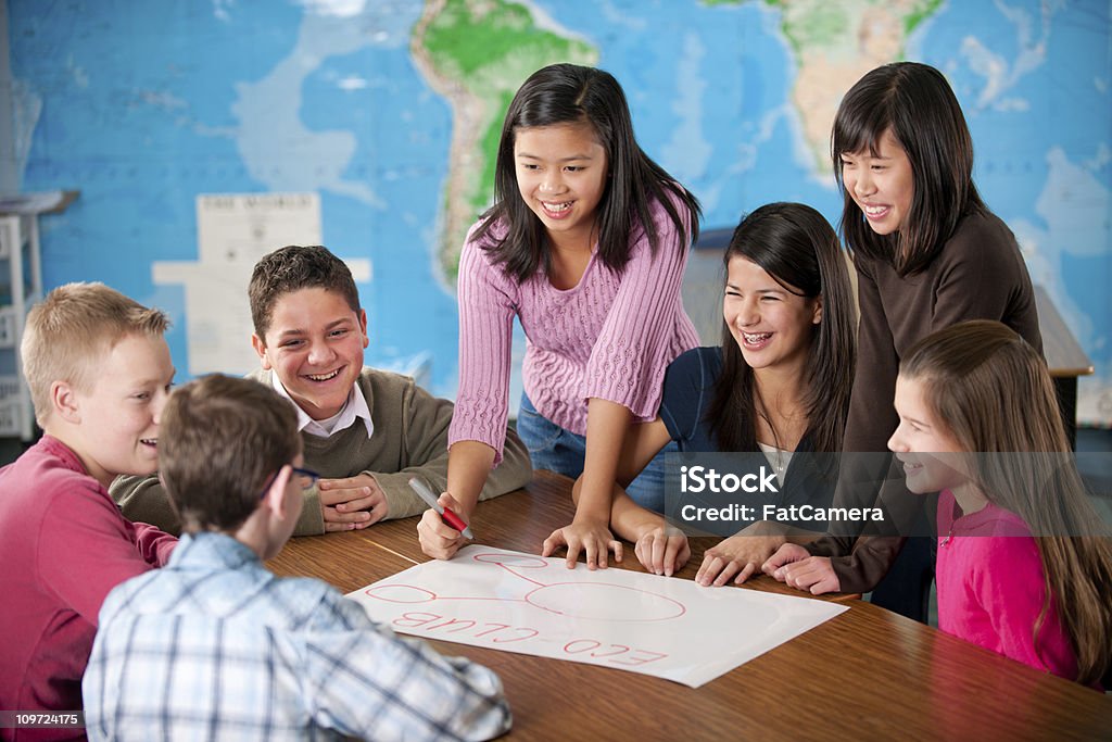 Eighth grade Eighth graders in a classroom working on a project. -   Global Stock Photo