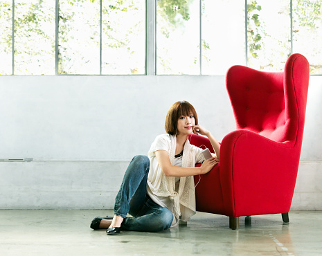 Japanese woman listening to music. Istockalypse Japan, Tokyo