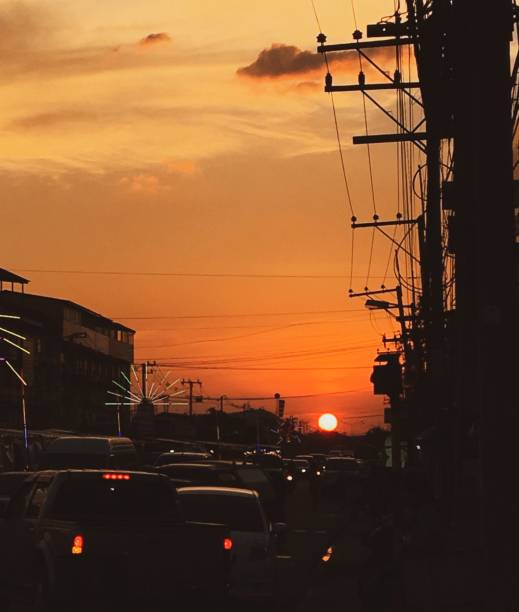 istock silhouette high voltage pole on sky sunset in  bangkok . 1097246932