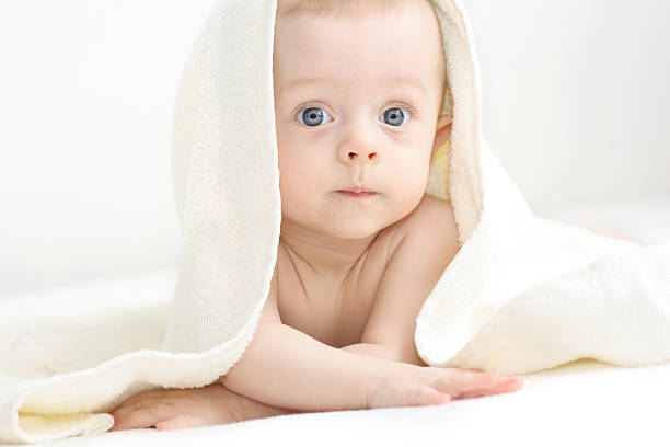 istock Portrait of Baby Hiding Under Towel 109724710