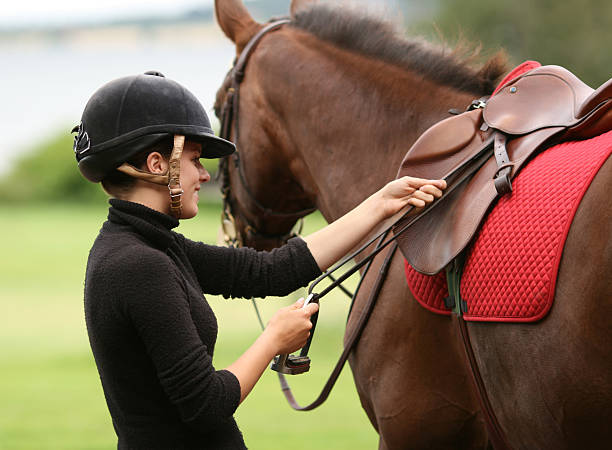 istock Girl getting ready for horseback riding, Norway 109724943