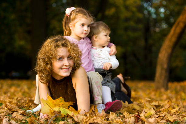 istock Beautiful family in autumn park 109724947