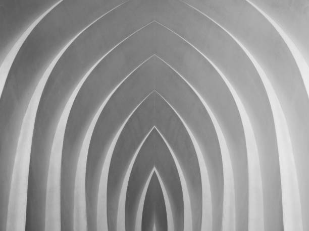 istock Computer graphic image of architectural fragment with stair-step structure resembling curvilinear arch, niche or top view of minimalist sitting places / benches. Abstract black and white modern architecture background in neo-Gothic style. 1097252506